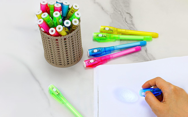 30 Pieces Invisible Ink Pens on the Table