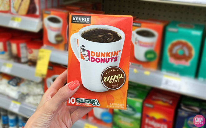 A Person Holding A Box of Dunkin Original Blend Keurig K Cup Pods