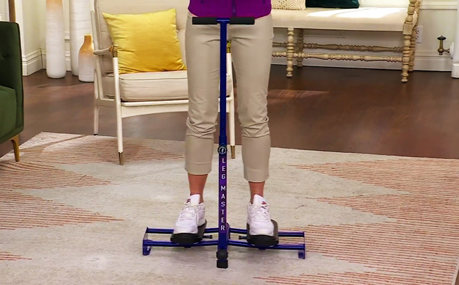 A Person Using Summers Leg Master Lift Tone Strengthening Machine A Person Using Summers Leg Master Lift Tone Strengthening Machine