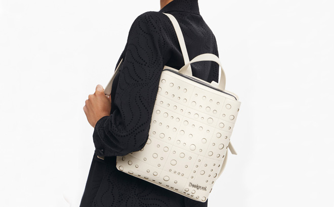 A Person Using a Desigual Faux Leather Backpack