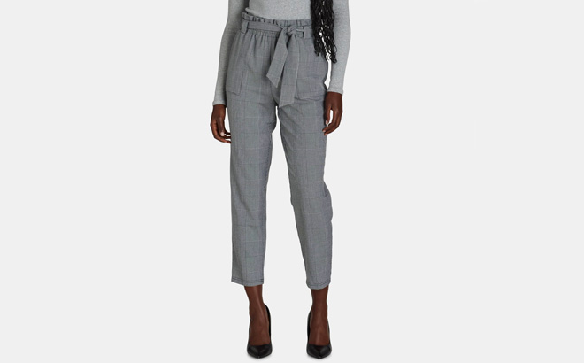 A Person Wearing Cropped Paper Bag Waist Pants A Person Wearing Cropped Paper Bag Waist Pants