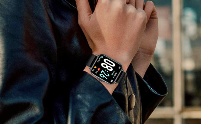 A Person Wearing a Bluetooth Smart Watch A Person Wearing a Bluetooth Smart Watch