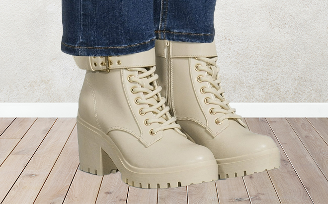A Person Wearing the No Boundaries Womens Lace Up Motto Boots