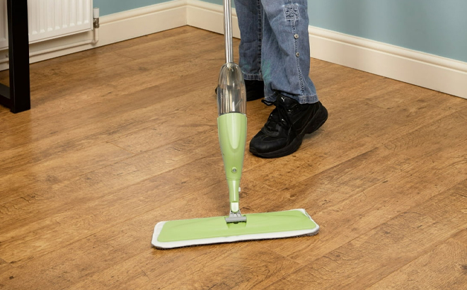 A Person using Ewbank Spray Mop