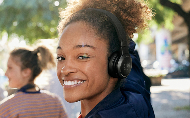 A Person wearing JBL Wireless Noise Cancelling Headphones