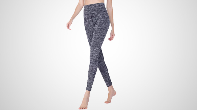 A lady wearing Tirrinia Womens Tummy Yoga Pants Leggings