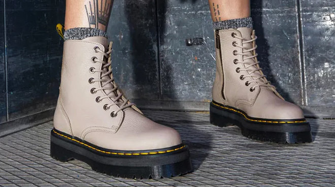 A person wearing a pair of Dr Martens Jadon Platform Womens Boots A person wearing a pair of Dr Martens Jadon Platform Womens Boots