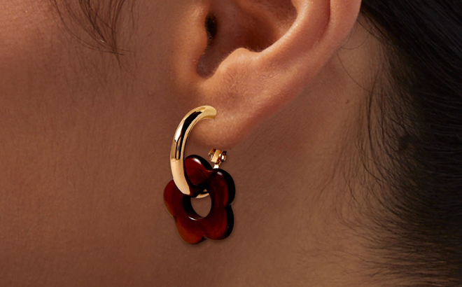 Claires Gold tone Tortoiseshell Chunky Flower 30MM Hoop Earrings on an Ear