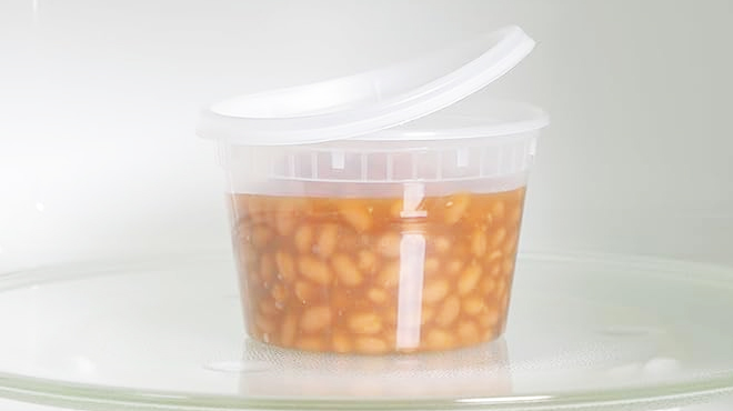 Freshware Food Storage Container filled with beands inside a microwave Freshware Food Storage Container filled with beands inside a microwave