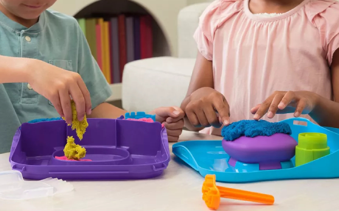 Kids Playing with Kinetic Sand SquishMotion Set