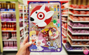 A Person Holding Polly Pocket Target Bullseye Adventure Doll Playset