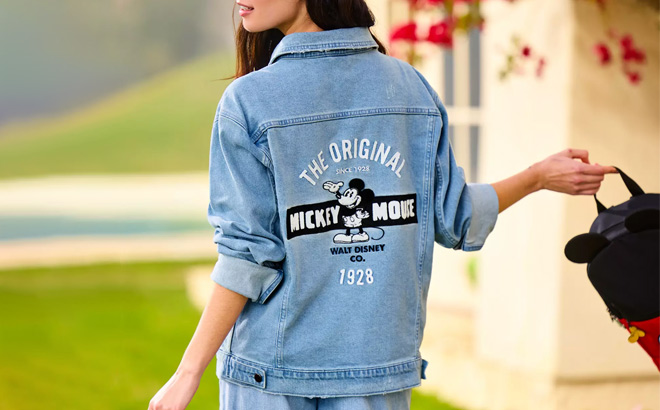 A Person Wearing Mickey Mouse Denim Jacket