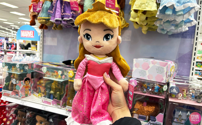 A person holding a Disney Princess Aurora Signature Collection Large Plush A person holding a Disney Princess Aurora Signature Collection Large Plush