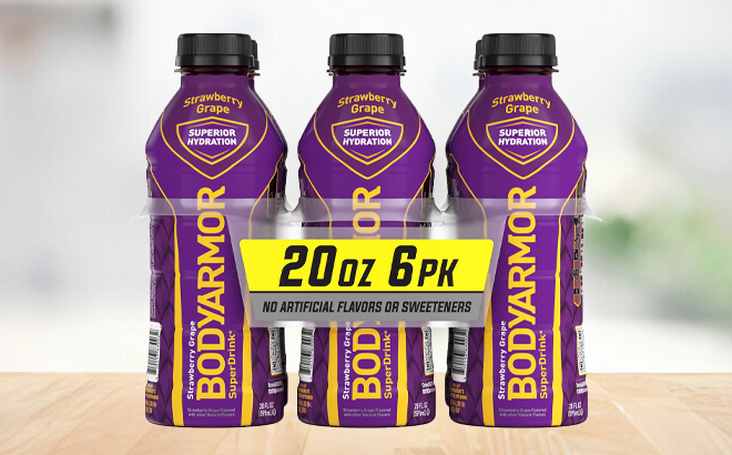 Bodyarmor Sports Drink Strawberry Grape Flavor 6 Pack on a Table