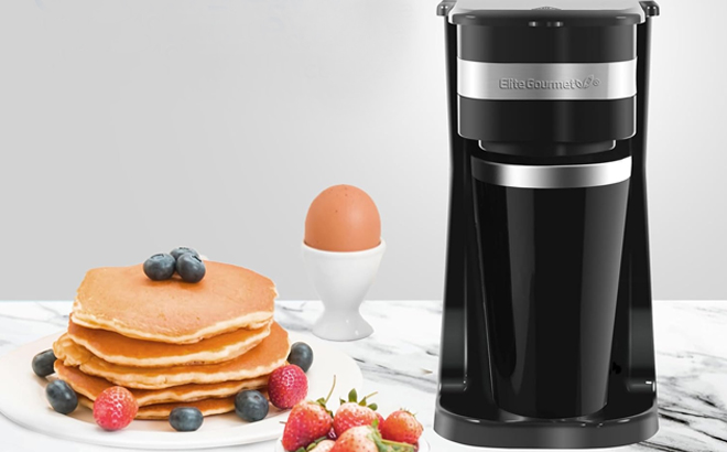 Elite Gourmet Single Serve Compact Coffee Maker on a Table Elite Gourmet Single Serve Compact Coffee Maker on a Table