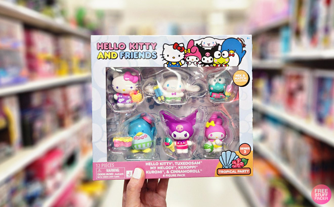 Hand Holding a Hello Kitty Neon Tropical Party Figure 6 Pack