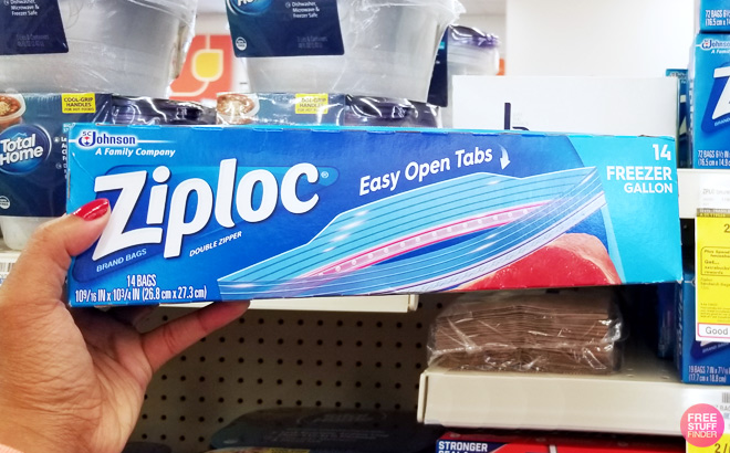 a Person Holding Ziploc Gallon Food Storage Freezer Bags 14 Count