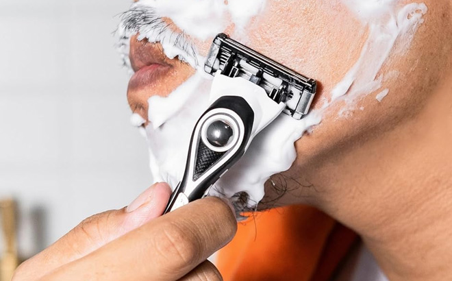 A Person Holding BIC Flex Razor A Person Holding BIC Flex Razor