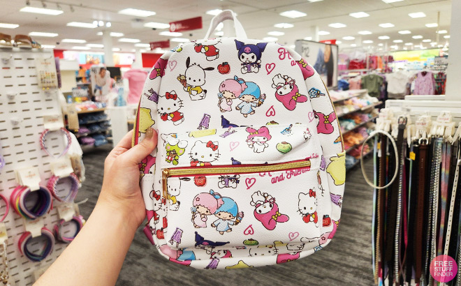 A Person Holding Hello Kitty and Friends Kids Mini Backpack A Person Holding Hello Kitty and Friends Kids Mini Backpack