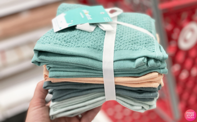 A Person Holding a Pillowfort Kids 8 Piece Washcloth Set