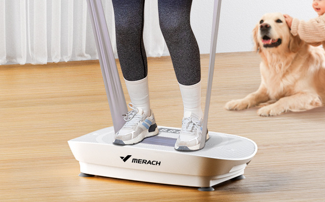 A Person Standing on Merach Vibration Plate Exercise Machine