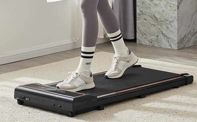 A Person Using Smug Compact Armless Treadmill
