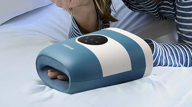 A Woman Using CINCOM Hand Massager