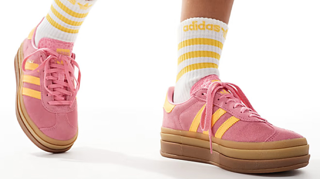 A Woman Wearing Adidas Originals Gazelle Bold Sneakers