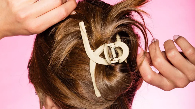 A person wearing a Gimme Beauty Tie Fine Hair Claw Clip 2 pc A person wearing a Gimme Beauty Tie Fine Hair Claw Clip 2 pc