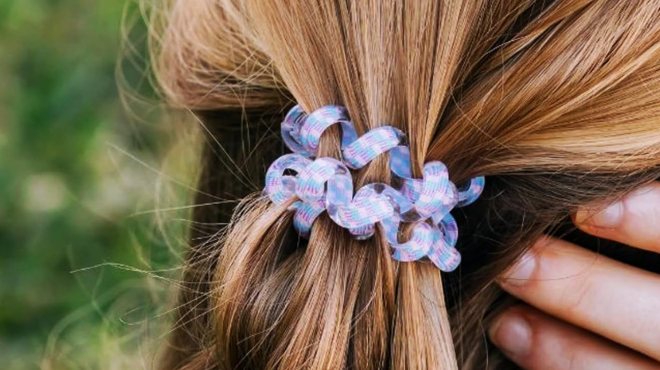 A person wearing a Teleties Spiral Hair Coils A person wearing a Teleties Spiral Hair Coils