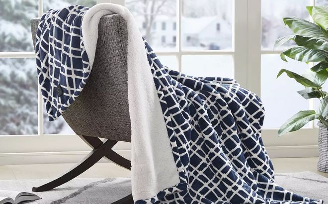 Serta Plush to Sherpa Heated Electric Throw Blanket on a chair