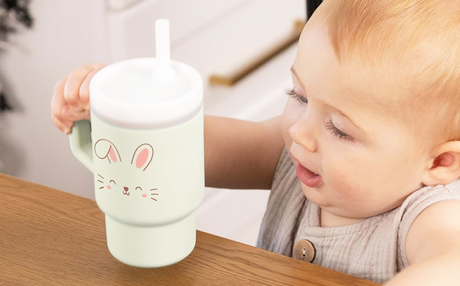 Toddler Holding Infantino Bunny My First Tumbler