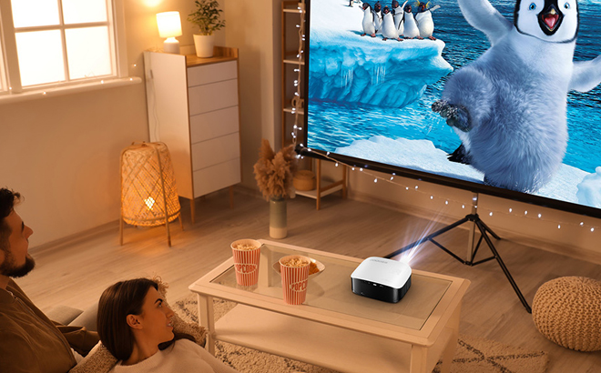 Two People Watching Projected Cartoon Two People Watching Projected Cartoon