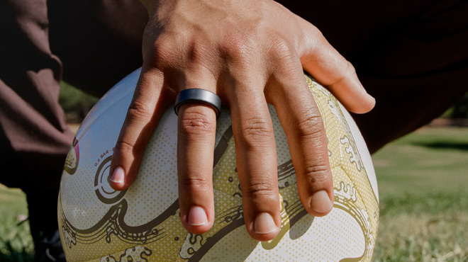 A Man Wearing Oura Ring 4 Stealth Color Titanium Smart Ring A Man Wearing Oura Ring 4 Stealth Color Titanium Smart Ring
