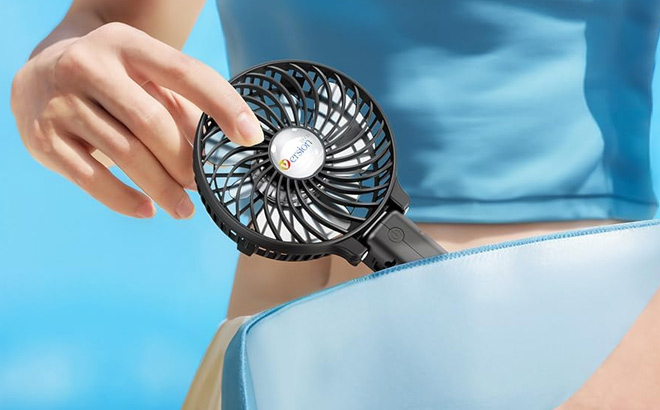A Person Holding VersionTECH Portable Handheld Fan
