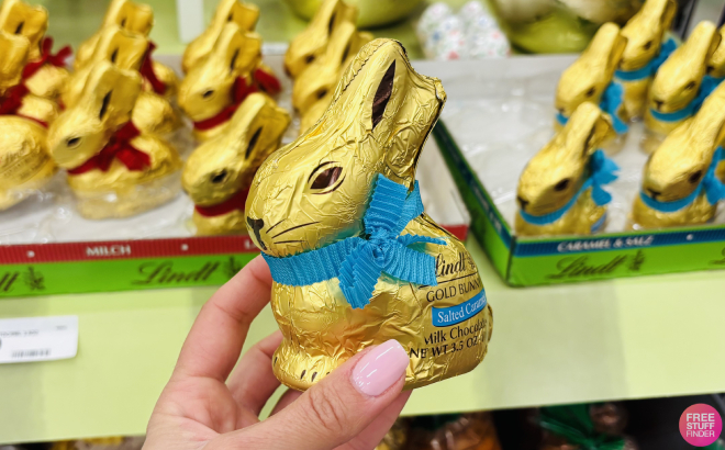 A Person Holding a Lindt Easter Gold Bunny Salted Caramel A Person Holding a Lindt Easter Gold Bunny Salted Caramel