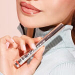 A Person Holding the Sacheu Lip Liner Stay N Peel Off Lip Stain