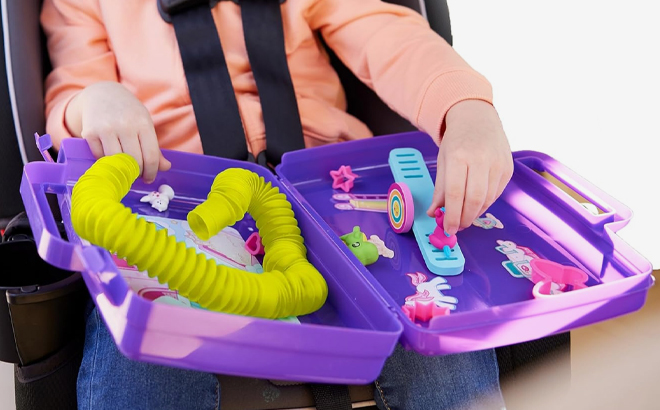 A Person playing with Sensory On The Go Magical Playground Kit A Person playing with Sensory On The Go Magical Playground Kit