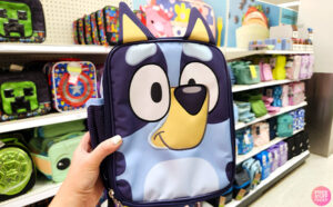 A hand holding a Bluey Kids Lunch Bag