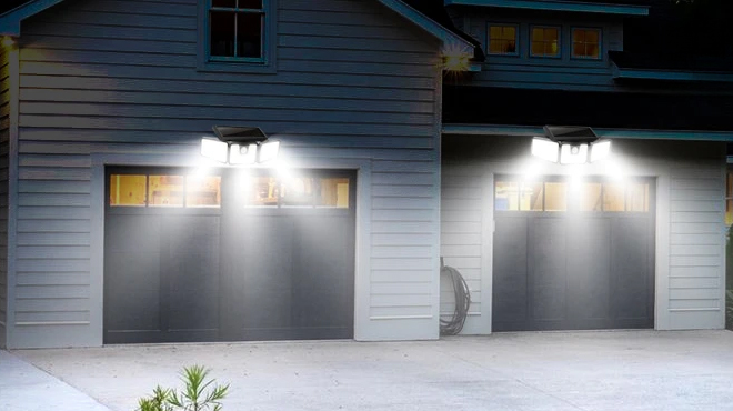 A house lighted up using a Ameritop 3 Head LED Sensor Lights