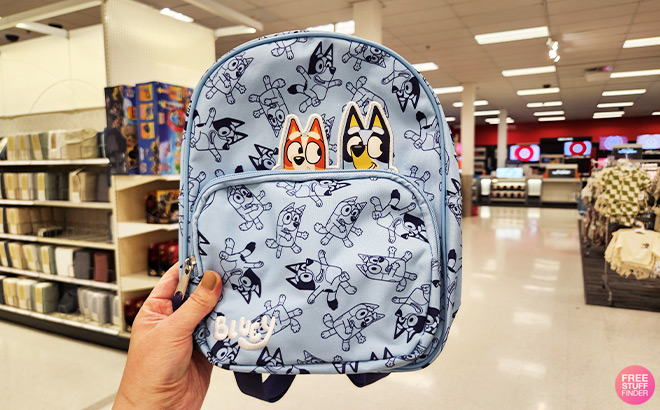 Hand Holding a Bluey Toddler Backpack