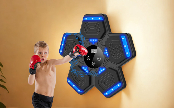 A Child Using a Lolbox Music Boxing Machine for Adults and Kids