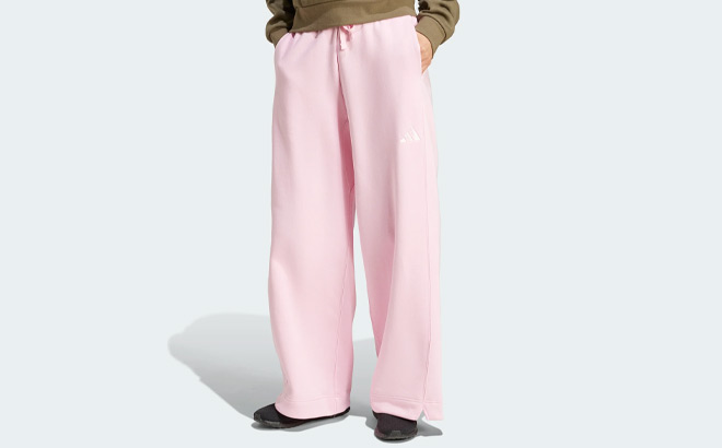 A Person Wearing Adidas Feece Wide Leg Pants