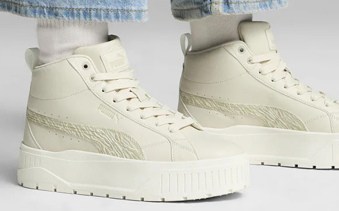 A Person Wearing PUMA Karmen II Mid Animal Fever Shoes