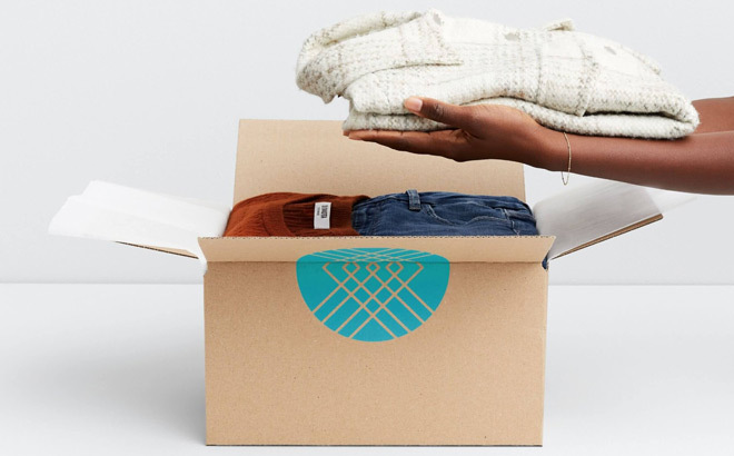 A Woman Unboxing a Stitch Fix Box