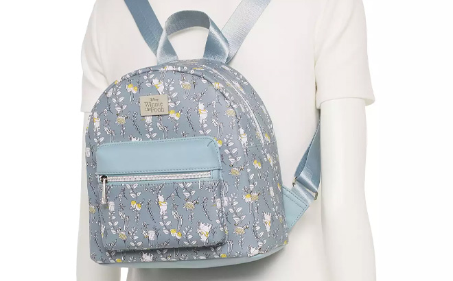 Licensed Character Winnie The Pooh Sketchy Floral All Over Print with Metal Badge Mini Backpack Licensed Character Winnie The Pooh Sketchy Floral All Over Print with Metal Badge Mini Backpack