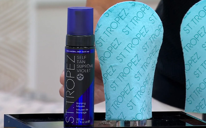 St Tropez Self Tanning Supreme Violet Bronzing Mousse with Mitt on the Table