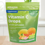 Vitamin C Supplement Drops 140 Count Bag on a Table