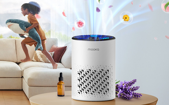 A Mooka HEPA Air Purifier with a Child Playing in the Background A Mooka HEPA Air Purifier with a Child Playing in the Background