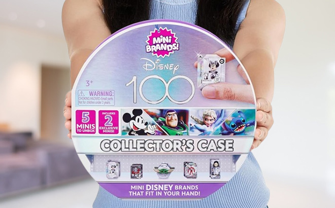 A Person Holding Mini Brands Disney 100 Platinum Collectors Case